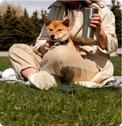 Owner holding Shiba dog